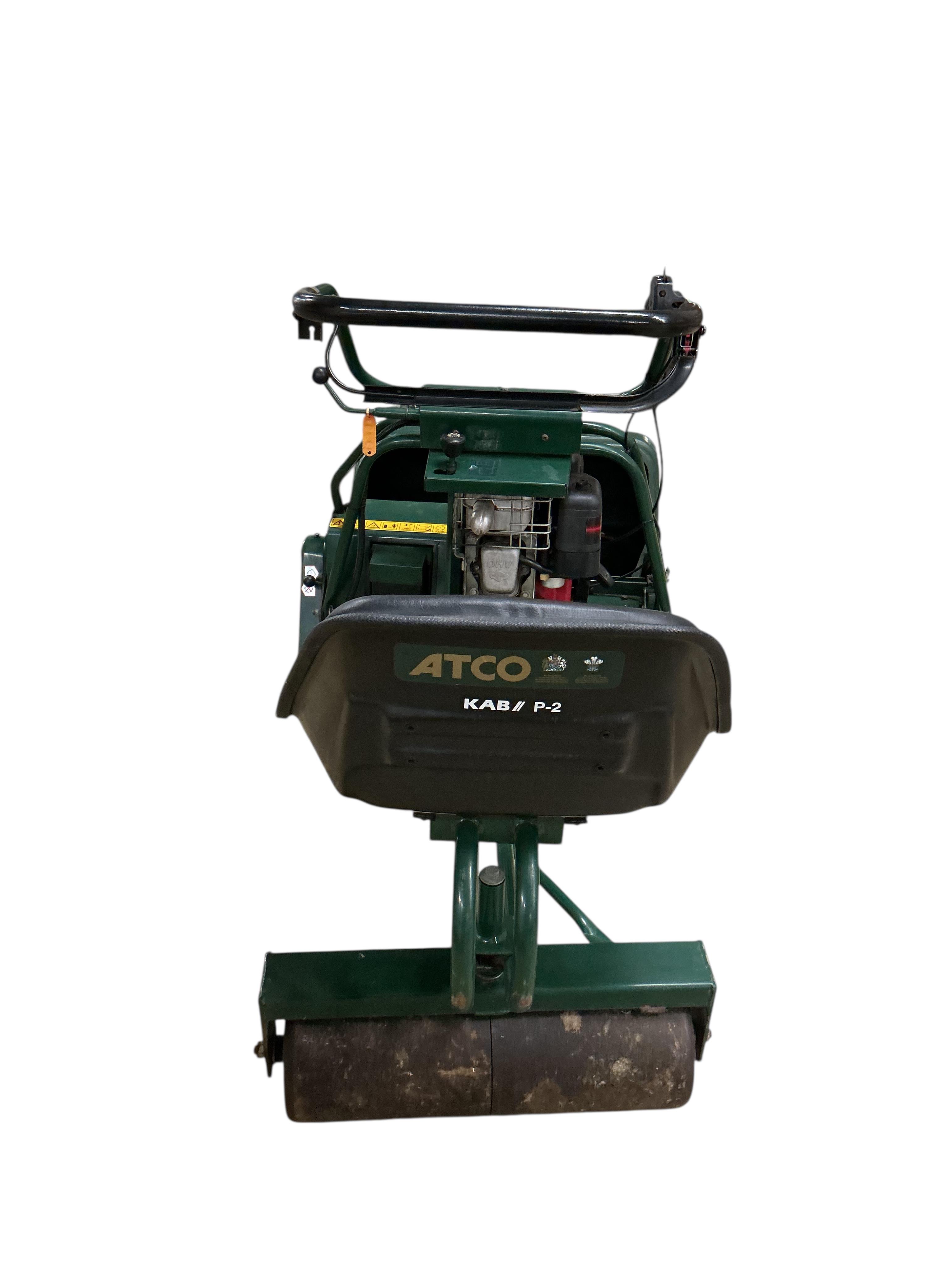 An Atco Royale 24E 6.5 HP 24inch ride on cylinder petrol mower. Serviced annually and in good working order with operating manuals